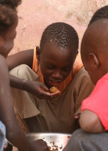 Children in Senegal enjoy a filling meal cooked on a 100 Liter nstitutional Cookstove by InStove. SSB